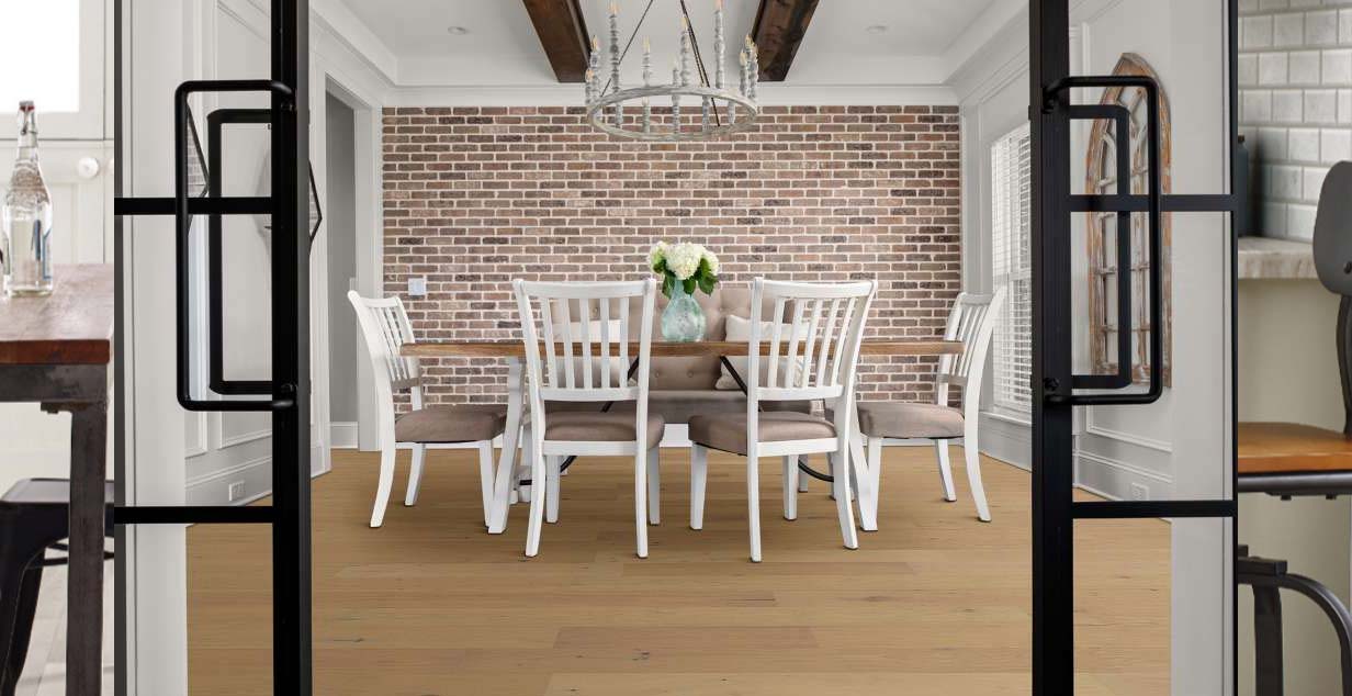view of a dining room table with hardwood flooring